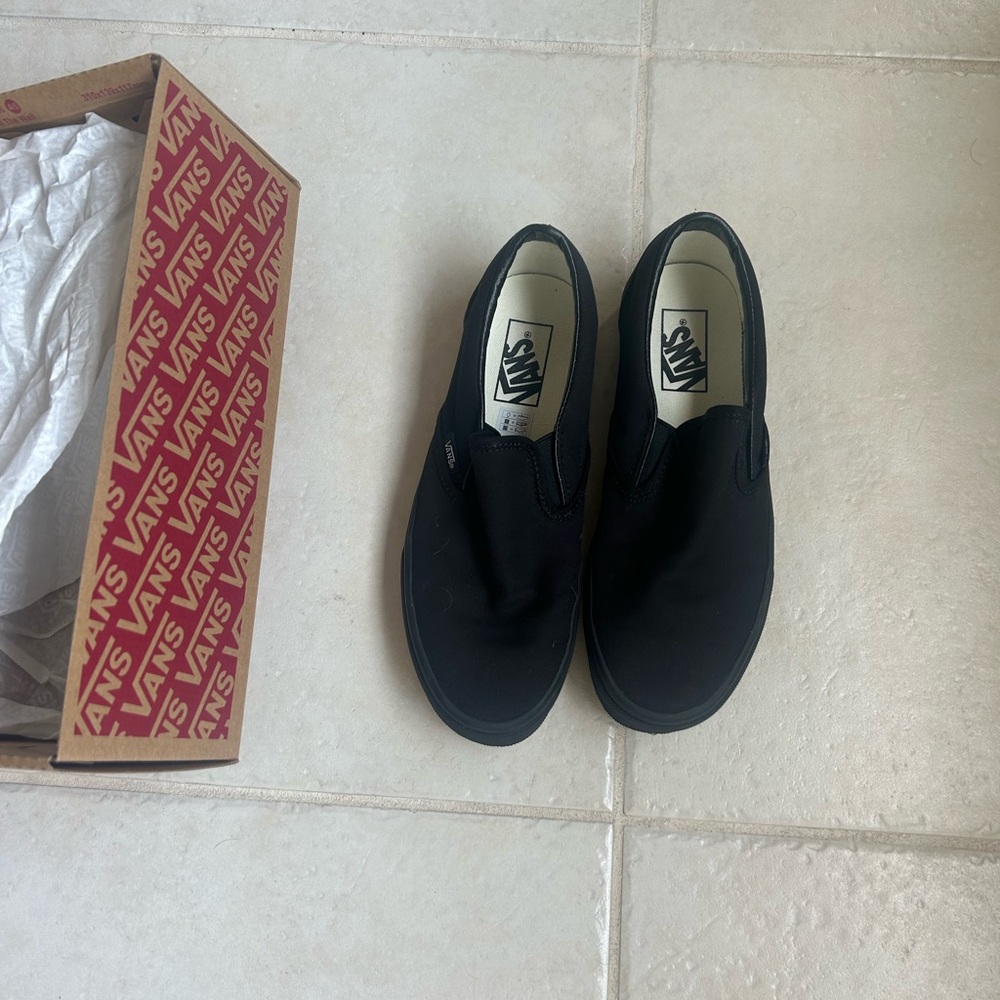 Vans Black Canvas Slip-Ons